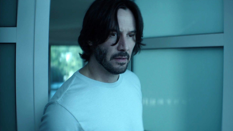 John Wick wearing white shirt