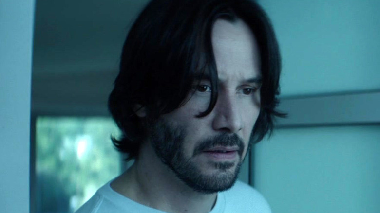 John Wick wearing white shirt