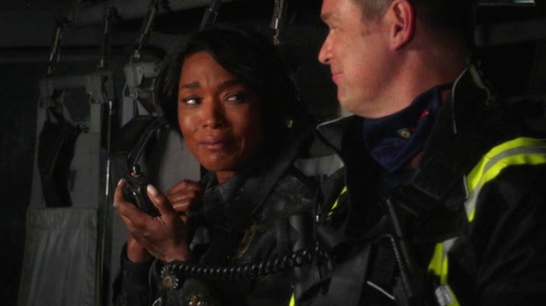 Peter Krause and Angela Bassett smile in 9-1-1