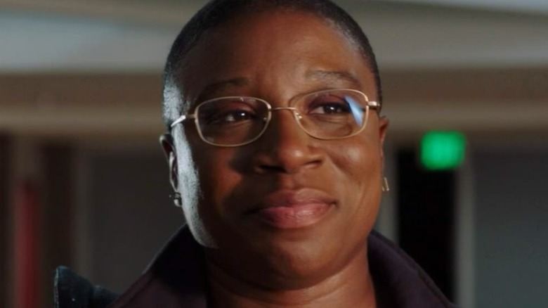 Aisha Hinds smiles in 9-1-1