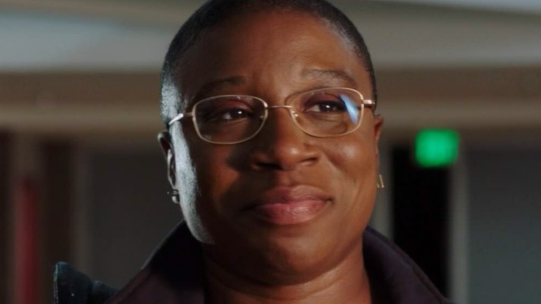 Aisha Hinds smiles in 9-1-1