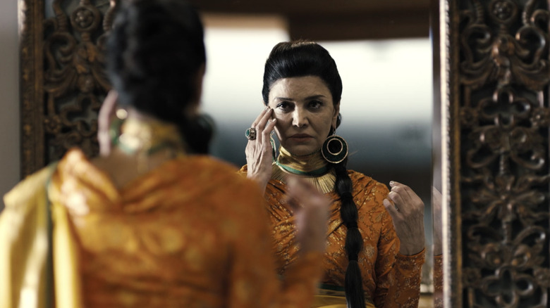 Chrisjen Avasarala in "The Expanse" looking at a mirror