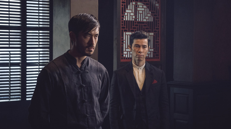 Ah Sahm stands on Warrior