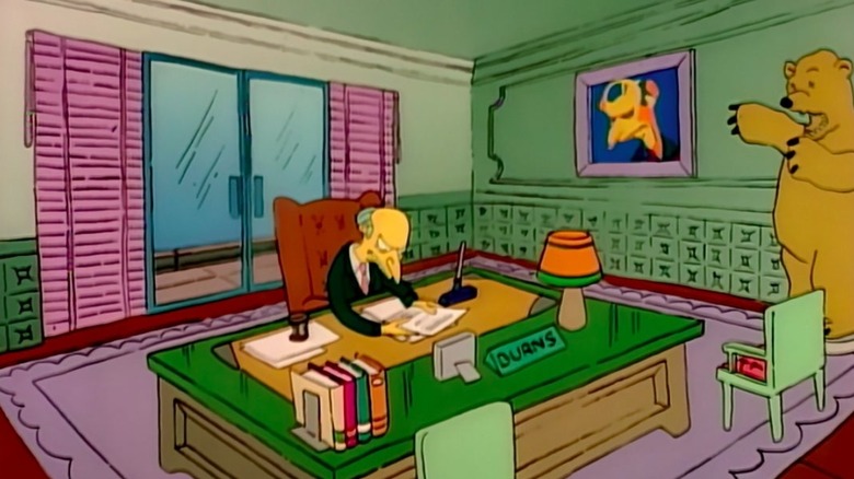 Mr. Burns sitting in office