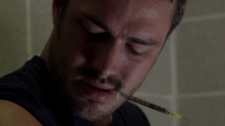 Severide bites needle