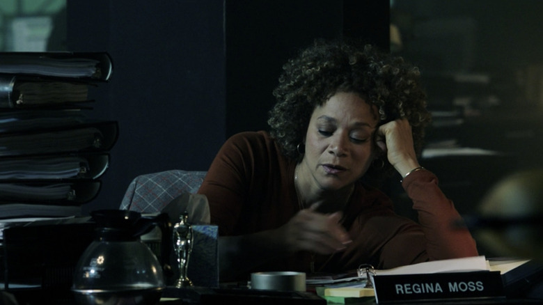 Regina at desk