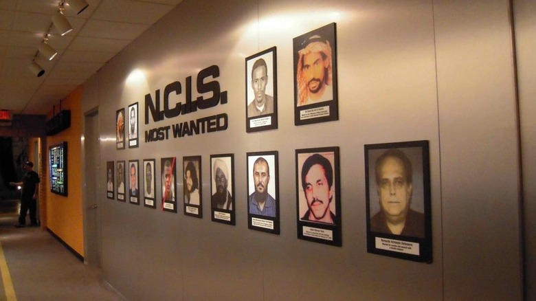 4. The decade-old "Most Wanted" list. One of the central features of the "NCIS" squad room is the wall of "Most Wanted" pictures. These posters have been a staple since the pilot episode and, after so many years, one has to wonder whether or not these characters are good at what they do. After Osama Bin Laden was killed by the Seal Team Six in 2011, they added a visible red cross on his picture on the wall. Ten years later, his picture is still on the wall with a cross. Can anyone explain the utility of retaining a ten-year-old "Wanted" picture of a dead man?