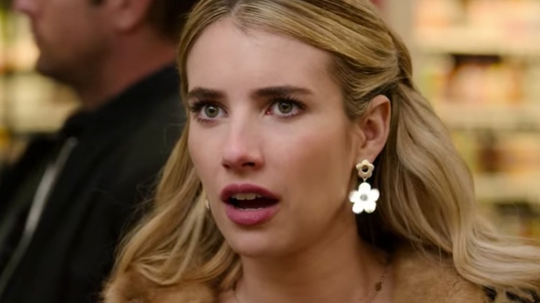 Holidate Emma Roberts in an awkward romantic scenario