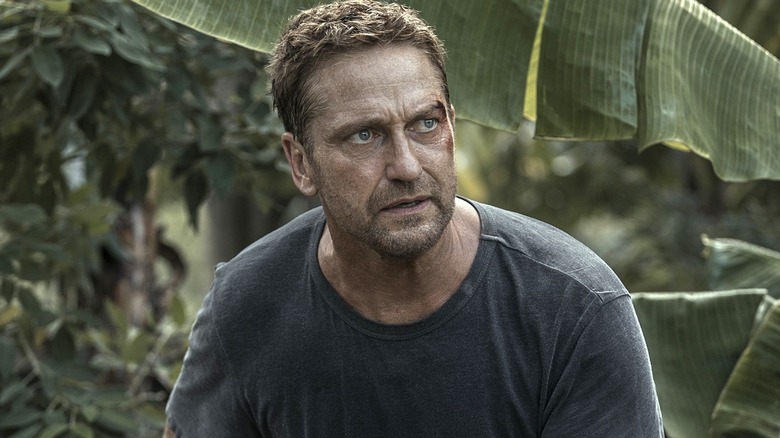 Torrance creeping through the jungle in 