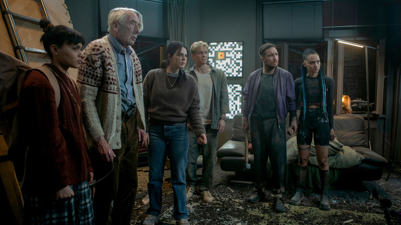 The gang stands around assessing the situation in Brick (2025)