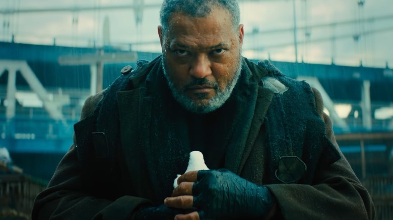 Lawrence Fishburne looking pensive in John Wick 3