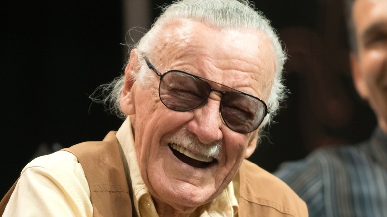 Stan Lee smiling with glasses 