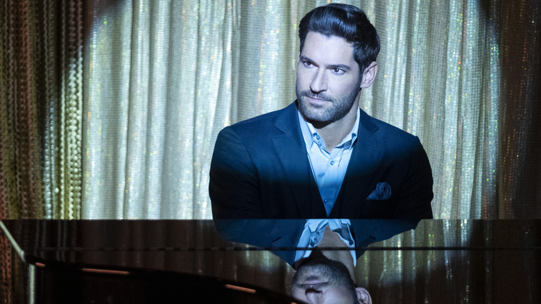Lucifer playing piano