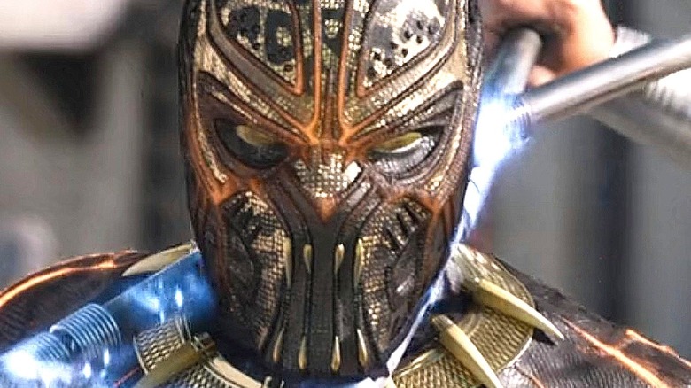 Killmonger wears gold helmet