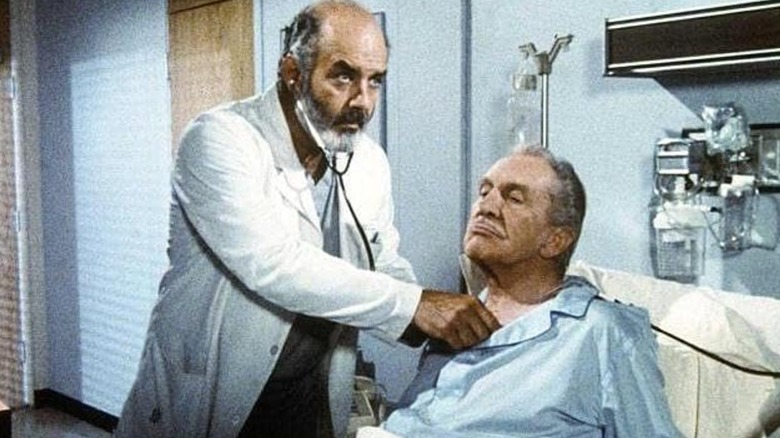Trapper John checks a patient in 