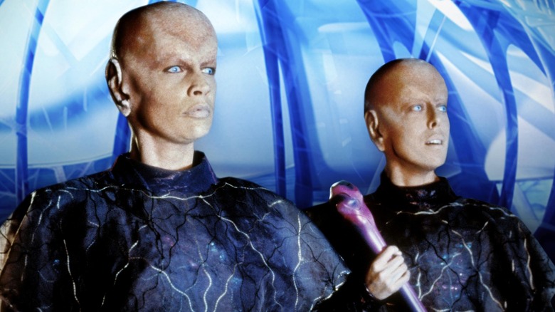 Two Taelons standing together in 