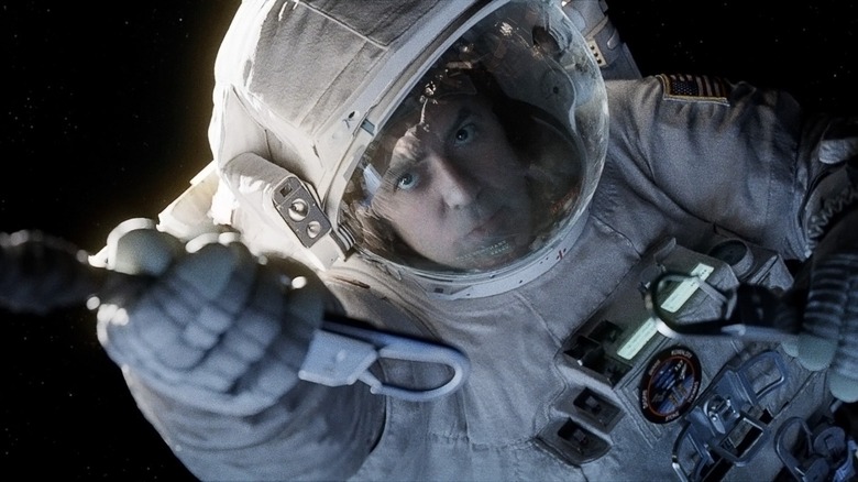 George Clooney floating away