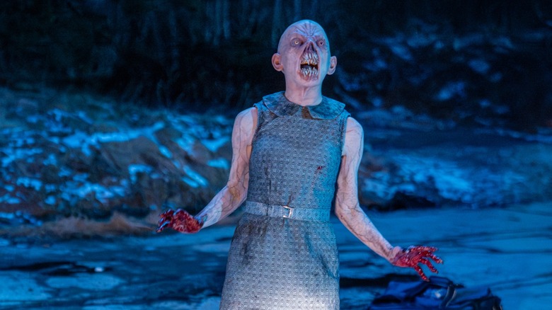 A monster screaming in From