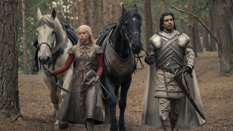 Rhaenyra Targaryen and Ser Criston Cole in the woods