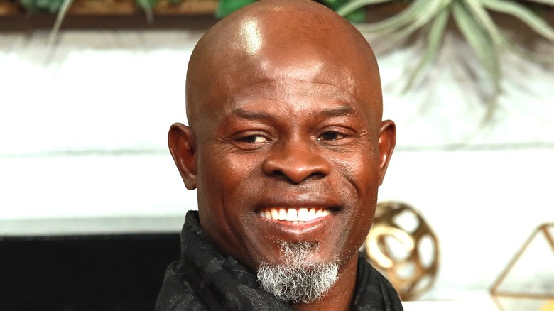 Djimon Hounsou smiling with small beard