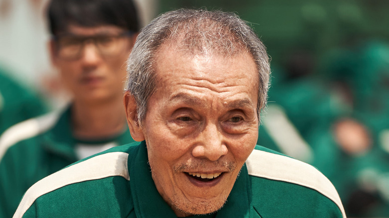 An older man competing in Squid Game