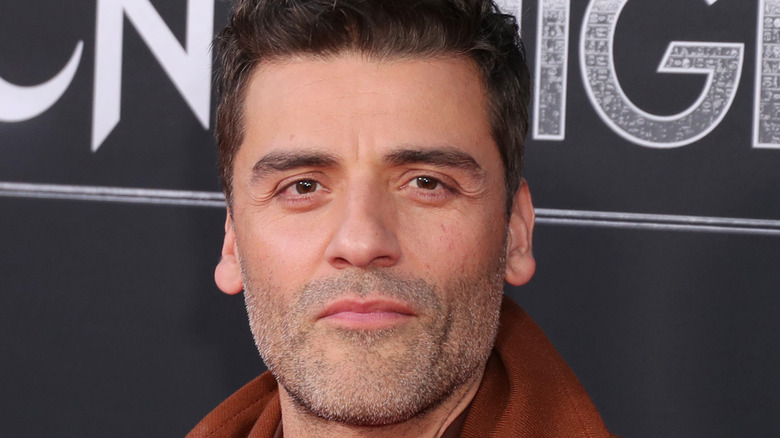 Oscar Isaac posing Moon Knight premiere 