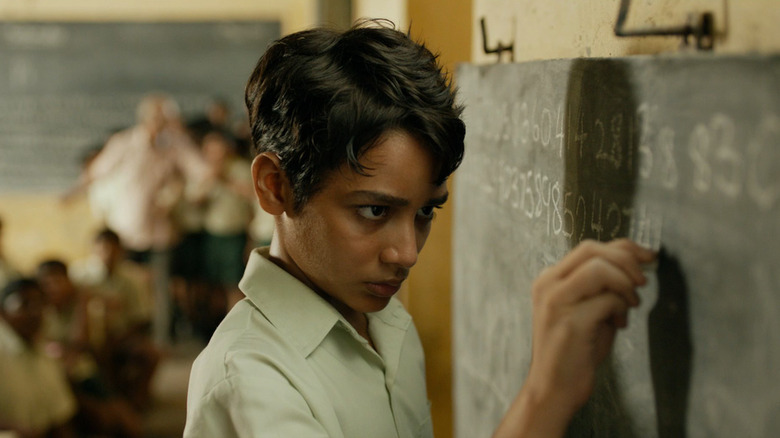 Pi writes Pi on the blackboard in Life of Pi