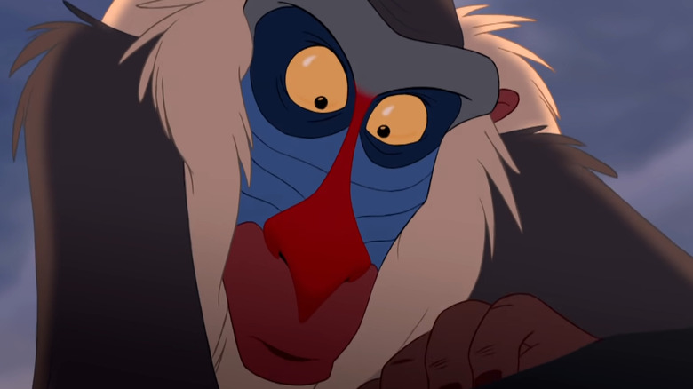 Rafiki looking at baby Simba