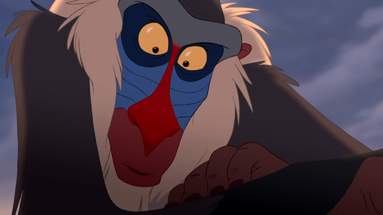 Rafiki looking at baby Simba