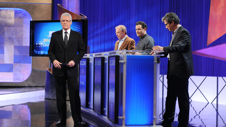 Trebek and contestants
