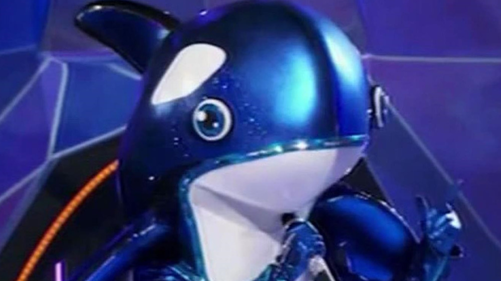 The Orca performing on stage in The Masked Singer