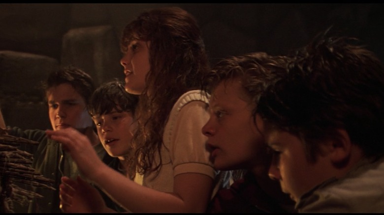 The Goonies kids looking on