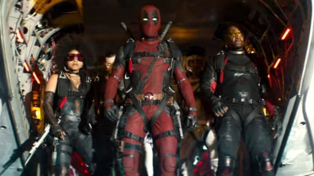 Domino, Deadpool, and Bedlam preparing to parachute