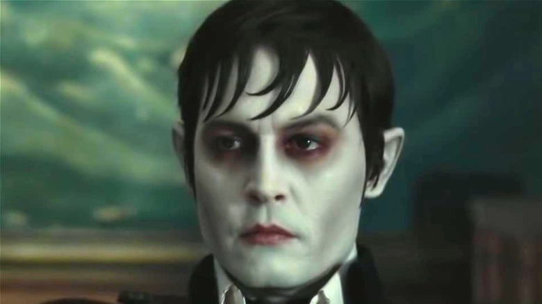 Johnny depp in vampire makeup in dark shadow 