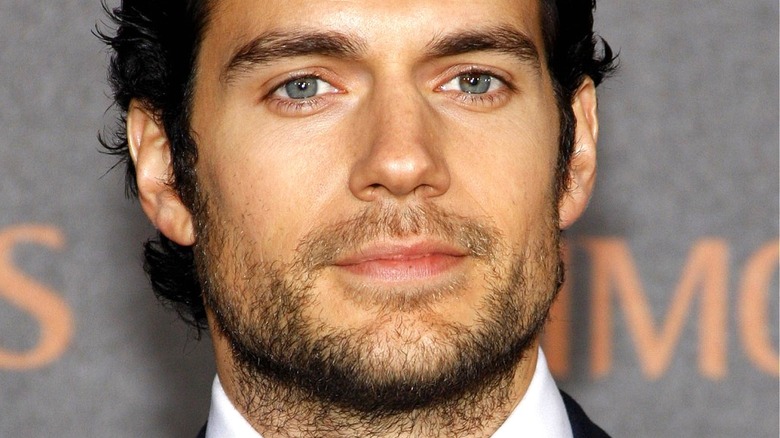 Henry Cavill posing for red carpet photos