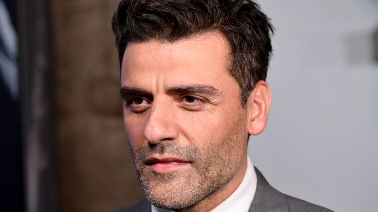 Oscar Isaac on a red carpet