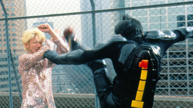 Kakihara and Ichi fighting