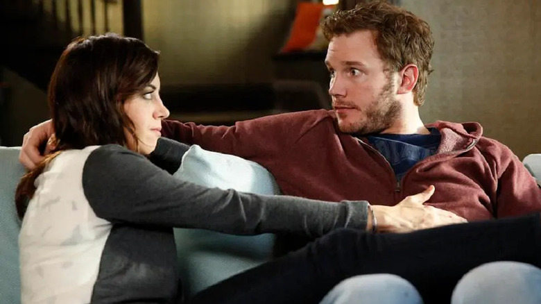April and Andy cuddling