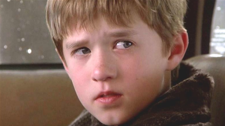 Haley Joel Osment looking somber