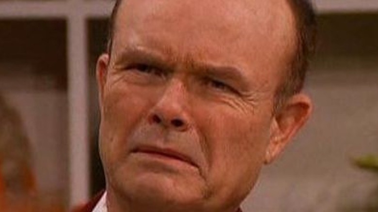 Red Forman looking upset