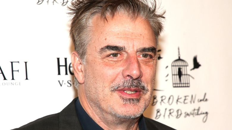 Chris Noth posing at event