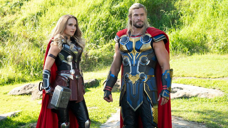 Jane Foster and Thor in grassy field
