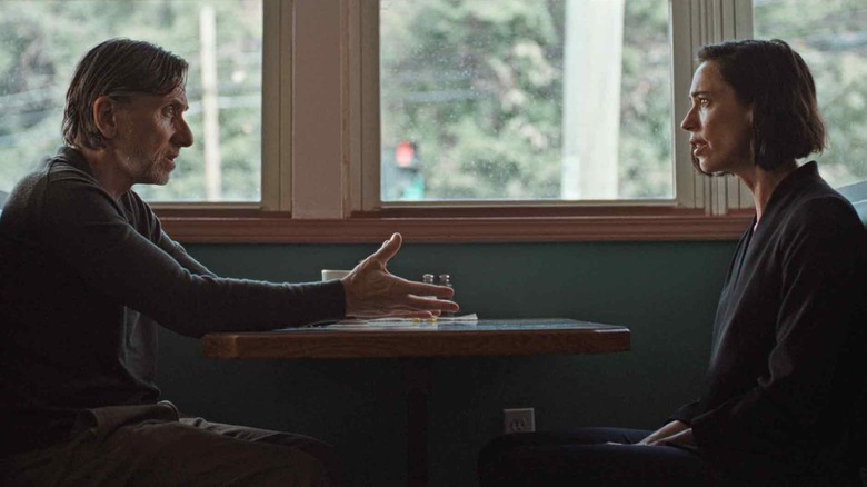 David and Margaret talk at a table in Resurrection