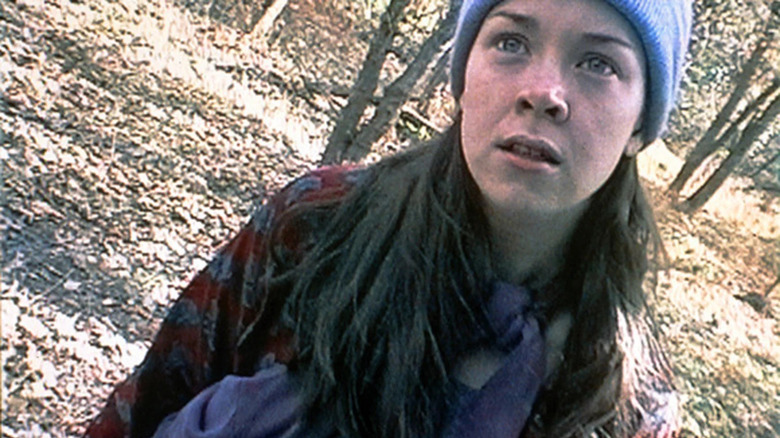 Heather as Heather Donahue in The Blair Witch Project (1999)