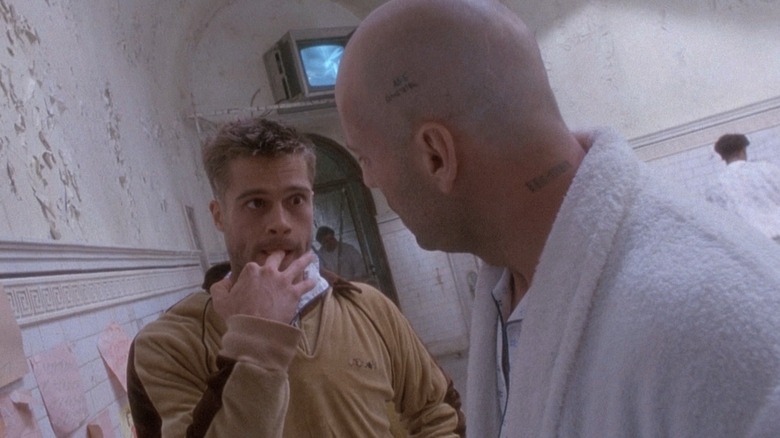 Bruce Willis as James Cole and Brad Pitt as Jeffrey Goines in 12 Monkeys