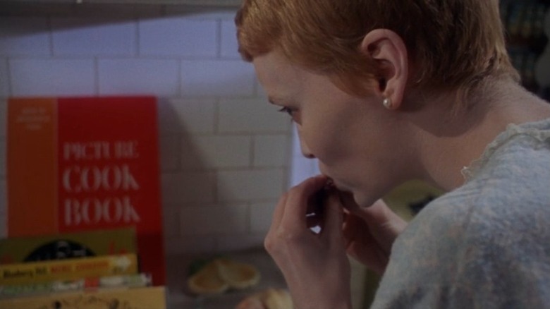 Mia Farrow eating chicken liver