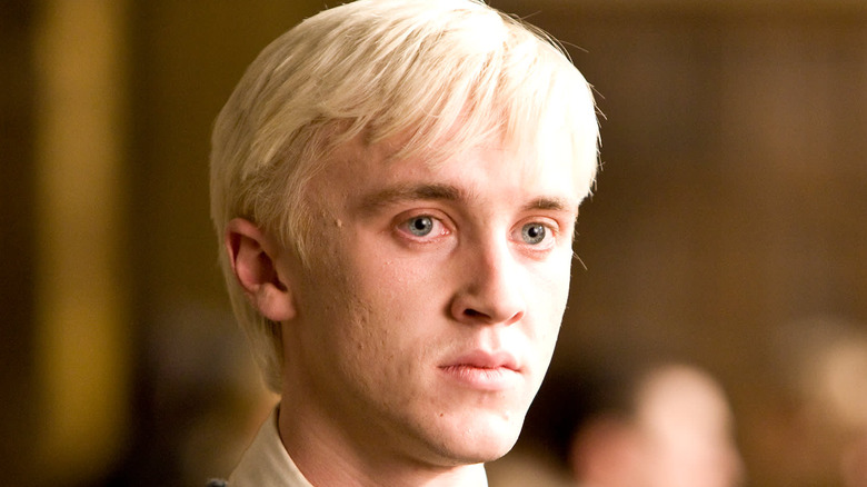 Draco Malfoy looking away