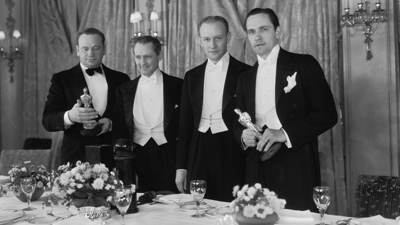 Fredric March, Lionel Barrymore, Wallace Beery and Conrad Naegle at the 5th Oscar Ceremony