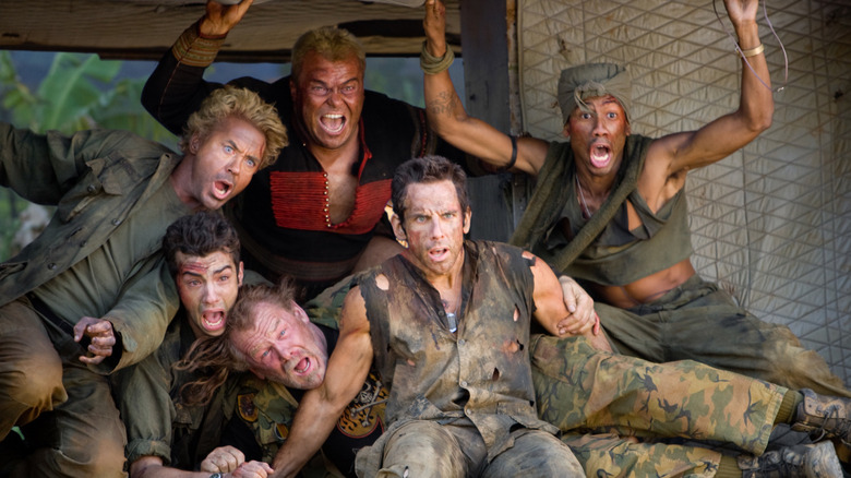 The cast of "Tropic Thunder" looking out of a helicopter