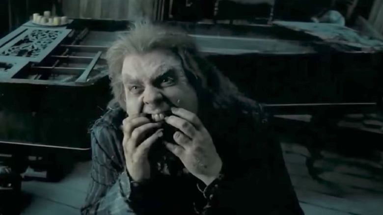 Peter biting teeth